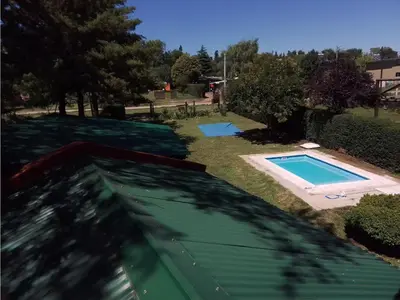 an overhead view of a swimming pool in a yard at Claro de Luna in Los Reartes