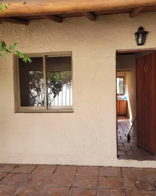 a house with a door and a window on it at Viva raíz in Nono
