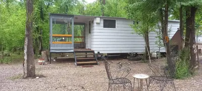 a tiny house in the middle of the woods at Complejo de cabañas Munay Ki in Santa Rosa de Calamuchita