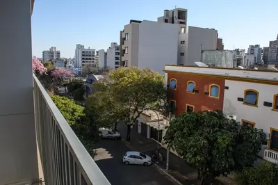 a view of a city from a balcony of a building at Hale Kalena in Cordoba