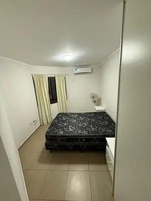 a bedroom with a bed in a room at Departamento Olivos IV in Villa Carlos Paz
