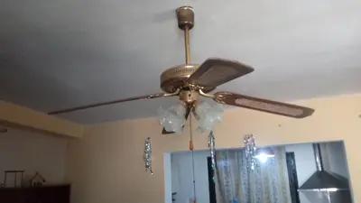 a ceiling fan is hanging from a ceiling at Sierras de Córdoba in Santa María