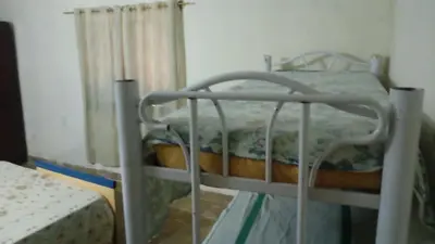 a bunk bed in a room with a bed frame at Sierras de Córdoba in Santa María