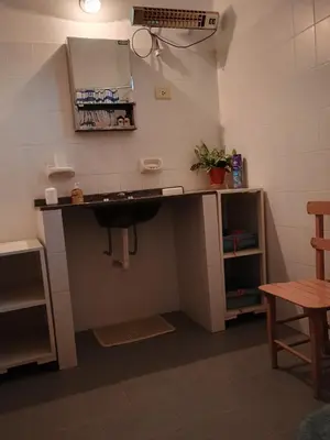a bathroom with a sink in a room at Los Bubos in Villa Los Aromos