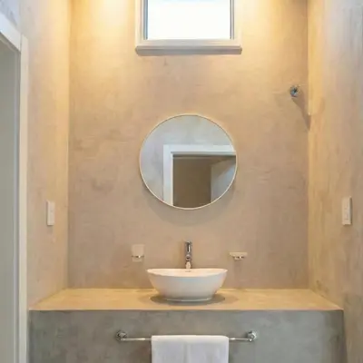 a bathroom with a sink and a mirror at Casa Olivia - Alquiler temporario en Tanti in Tanti