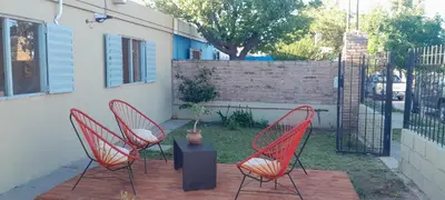 two chairs and a table on a patio at Majo in San Francisco del Monte de Oro