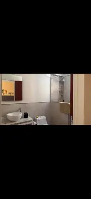 a bathroom with a sink and a toilet at Departamento monoambiente in Villa Carlos Paz