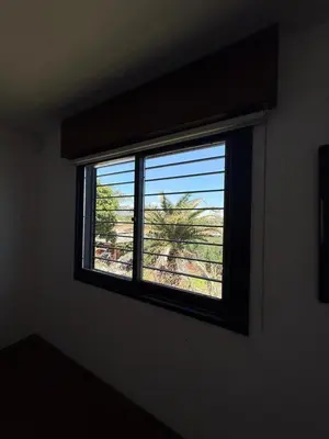 a window in a room with a view at Departamento El Fantasio in Villa Carlos Paz