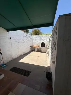 a view from the inside of a building with a green tent at Departamento El Fantasio in Villa Carlos Paz