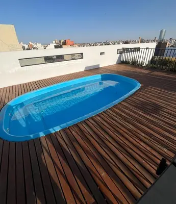 a swimming pool on the roof of a building at Calma Urbana in Cordoba