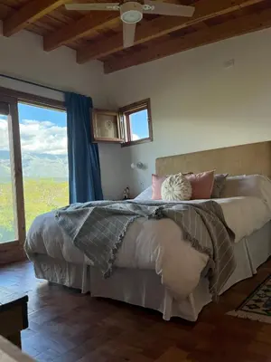 a bedroom with a large bed with a large window at Casa Estudio Japandi in San Javier