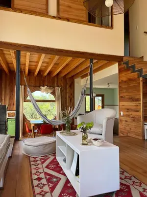 a living room with a couch and a table at Casa Estudio Japandi in San Javier