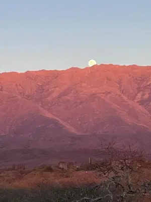 a moon sitting on top of a mountain at Casa Estudio Japandi in San Javier