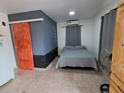 a bedroom with a bed in a room at Adonay in Mina Clavero