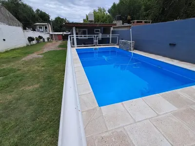 an overhead view of a swimming pool in a yard at Adonay in Mina Clavero
