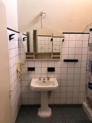 a bathroom with a sink and a mirror at Chalet Ferrari in Mina Clavero