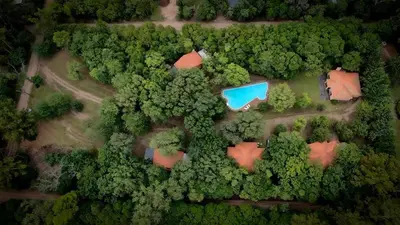 an overhead view of a yard with a house and trees at Portal del Bosque in Villa Ciudad Parque