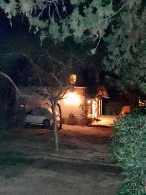 a car parked in front of a house at night at Tenderete in Villa General Belgrano