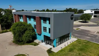 an overhead view of a building in a parking lot at Apart Lunge in Cordoba