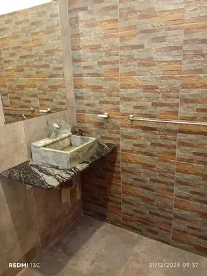 a bathroom with a sink and a shower at La Cautivadora, Potrero de Garay in Potrero de Garay