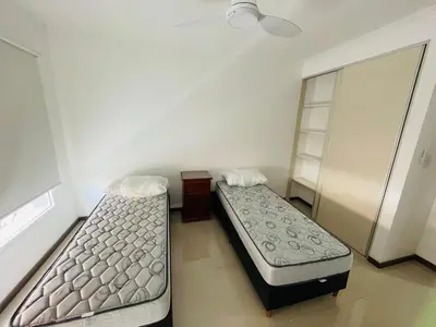 a room with two beds in a room at Veneto VIII in Villa Carlos Paz