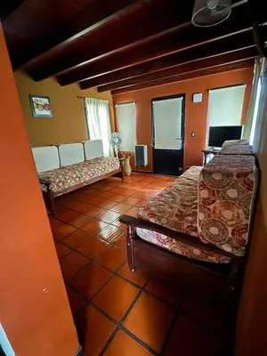a bedroom with two beds in a room at Tayimapu in Merlo