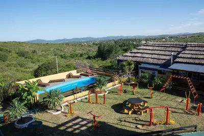 an aerial view of a water park with a playground at Parada 14 in Cavalango