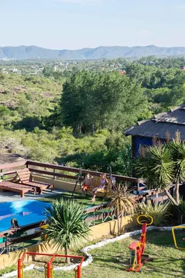 a childrens play area with a pool and slides at Parada 14 in Cavalango