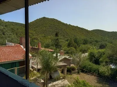 a view of a mountain from a house at La Serranita de Miguel in Villa Serranita