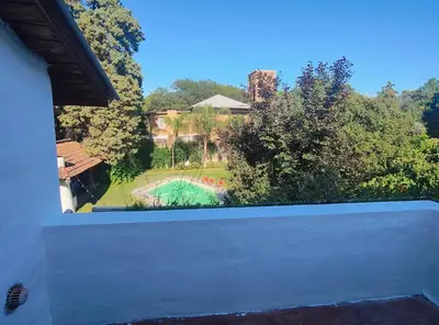 a view of a backyard with a swimming pool at Casa Mudita in Cordoba