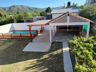 a pavilion with a swimming pool in a backyard at La soñada San Antonio de Arredondo in San Antonio de Arredondo