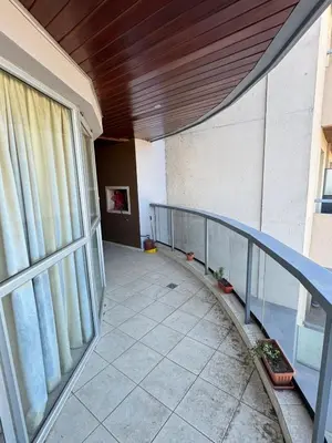 a balcony of a building with a large window at 2point in Río Tercero