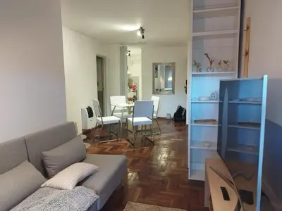 a living room with a couch and a table at Departamento para 3 personas Zona Nueva Córdoba in Cordoba