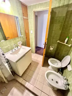 a bathroom with a sink and a toilet at Departamento amplio 4 personas Zona Nueva Córdoba in Cordoba