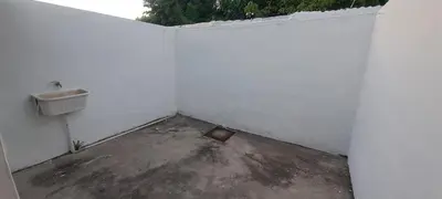 a white room with a sink and a toilet at Complejo La Paz in Villa Carlos Paz