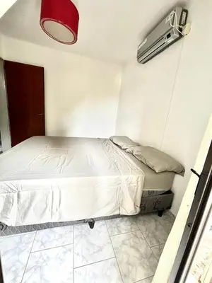 a small bedroom with a bed in a room at alojamiento centrico vcp in Villa Carlos Paz