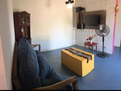 a living room with a couch and a box at Turismo CarlosPaz in Villa Carlos Paz