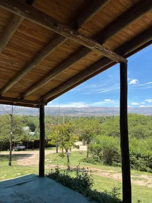 a view from the porch of a house with a roof at Complejo Alto Paraiso in Villa Cura Brochero