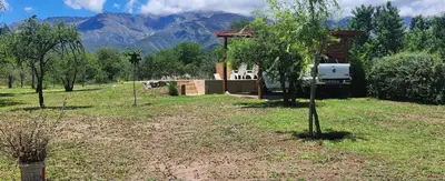a yard with a gazebo and a tree at Aire de montaña in Quebrada de los Pozos