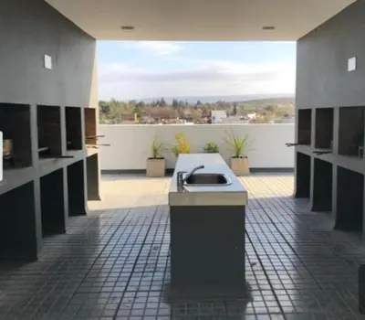a bathroom with a sink in the middle of a building at Venetto IV in Cordoba