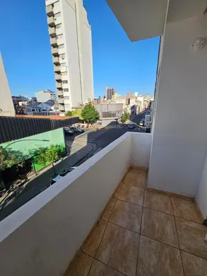 a balcony with a view of a city at La Rioja Apartamento in Cordoba
