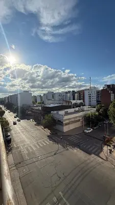 a view of a parking lot in a city at Güemes Apartamento in Cordoba