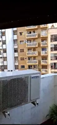 a air conditioner on the side of a building at Departamento Balcarce 455 in Cordoba