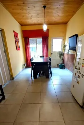 a dining room with a ping pong table in it at Casa de Ceci in Villa Carlos Paz