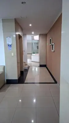 a hallway of an office building with a hallway at Departamento 2 H VIRREY in Villa Carlos Paz