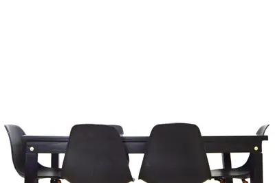 two black chairs sitting next to each other at Bellísimo apartamento con vistas a la ciudad in La Porteña