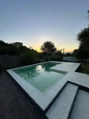 a swimming pool in the middle of a yard at La Soñada in San Roque