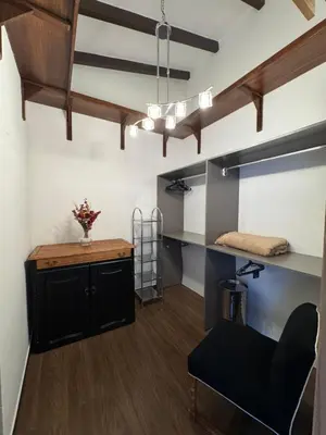 a room with a desk and a chair in a room at Villa Socrates in Villa Carlos Paz