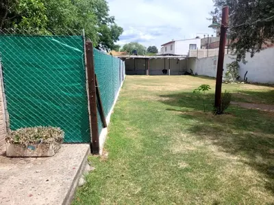a fence in the yard of a house at 