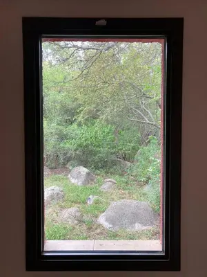 a window with a view of a forest at CasaMonte in San Javier